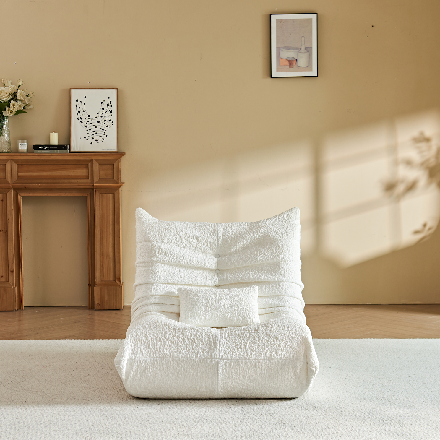 Zoovee's White Chenille bean bag chair in a room with a fireplace and decor