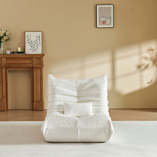 Zoovee's White Chenille bean bag chair in a room with a fireplace and decor