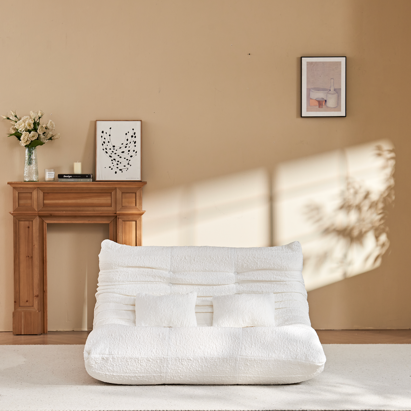 Zoovee's White Chenillebean bag chair loveseat in a room with a fireplace and decor