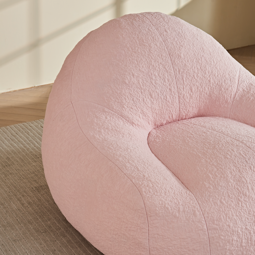 Zoovee's oversized chenille Pink bean bag chair on a carpeted floor